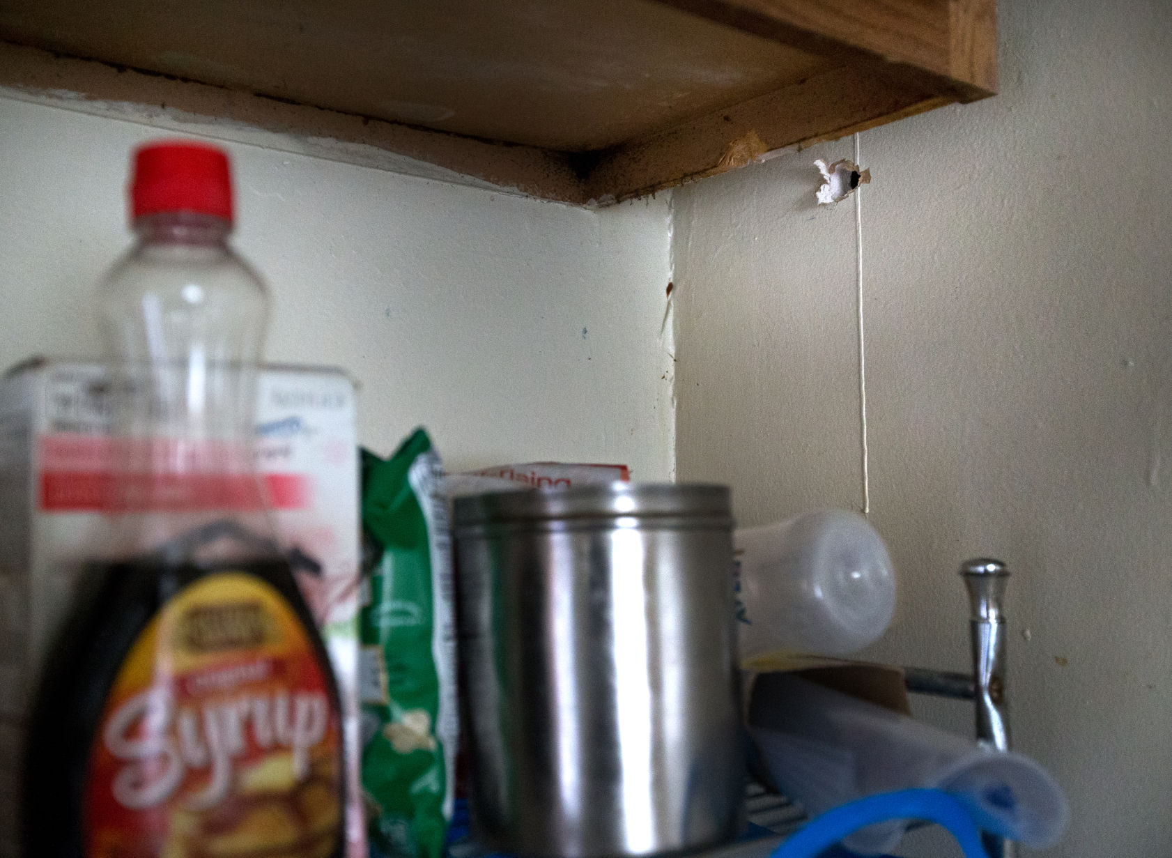 Bullet hole in kitchen